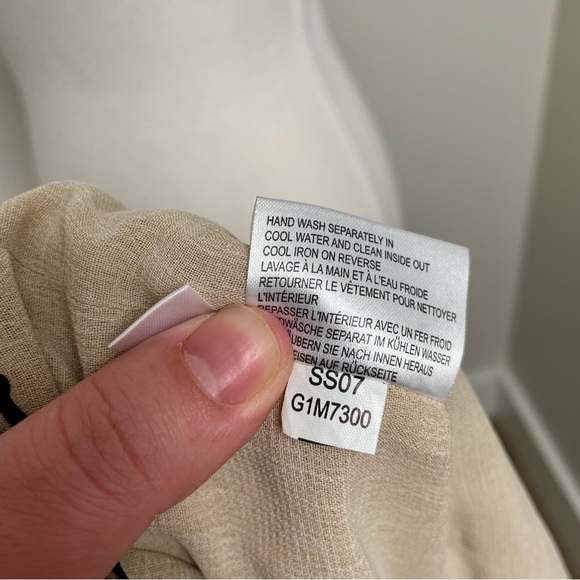 Elegant Beige Tank Top with Black Trim - Picture 8 of 8